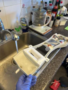 Refrigerator ice Dispenser Thaw and Cleaning Service