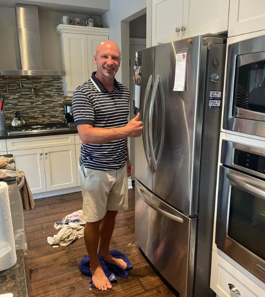 Our happy client after fridge repair